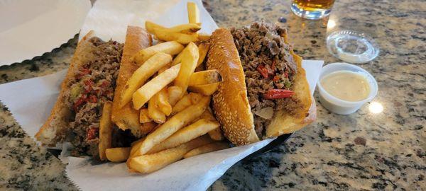 Cheesesteak with diced longhots and fries. Tons of meat. Great bar cheesesteak