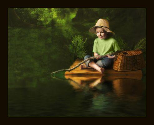 Quiden enjoys a fishing adventure in the Enchanted Forest at TearDrop Portrait