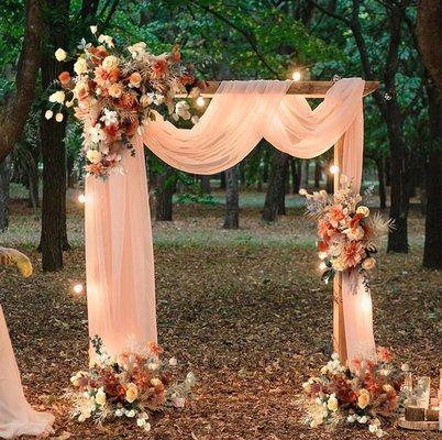 Decorative Wedding with sheer chiffon and 2 massive flowers arrangement and 2 ground arrangements to match the color of your event.