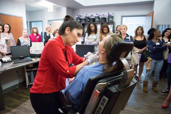 Our Expert Injector Christina Kang, RN demonstrating a Kybella treatment for reducing the double chin non-surgically