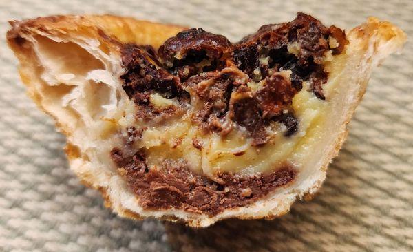 Cross section of the Chocolate Cocoa Nibs pasteis de nata (3/26/24)