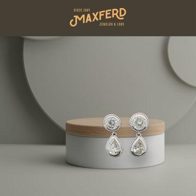 Step into a world of glamour with Maxferd's exquisite diamond earrings. Your journey to elegance begins here. Adorn, adore, and let your spa