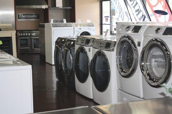 We offer several brands of front loading Washers and Dryers as well as the pedestal drawers.