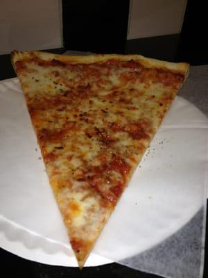 Plain slice with red pepper and oregano flakes!