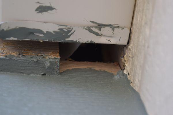 Hole left in siding after roof work