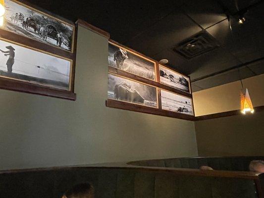 photos in dining room above booths