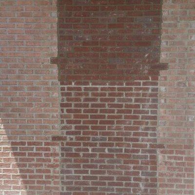 Masonry repair/replacement on existing wall.