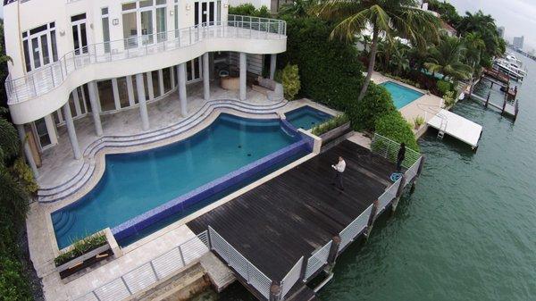 Infinity edge, glass tile river rok, swimming pool  Works in Hollywood, Davie, Weston, Southwest Ranches, Fort Lauderdale