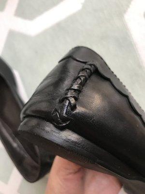 Broken stitching at heel repaired