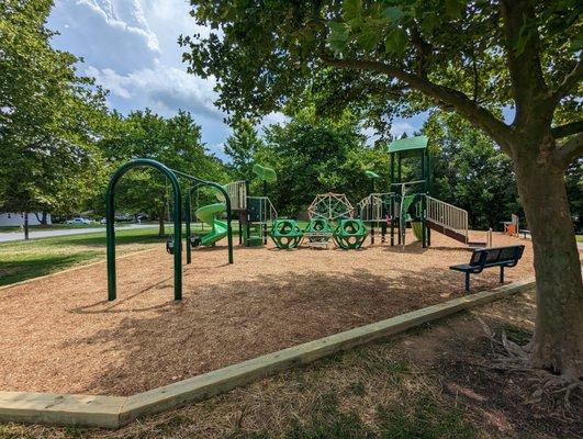 This is one of several views of the replaced playground.  Photo taken June 12, 2023.