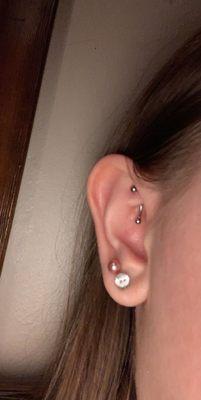 Piercings- rook, upper lobe - all done by Chris