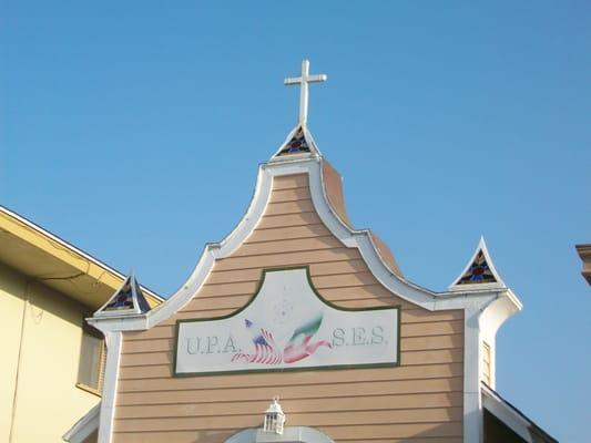 Beautiful stained glass detailing along the Gothic Revival-styled roof.