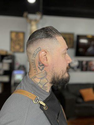 High razor skin fade traditional pompadour finished with a hot lather neck shave.