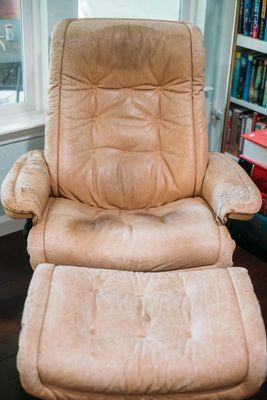 Before photo of our scratched leather recliner and ottoman