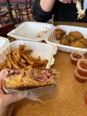 Reuben sandwich, fries and chicken wings