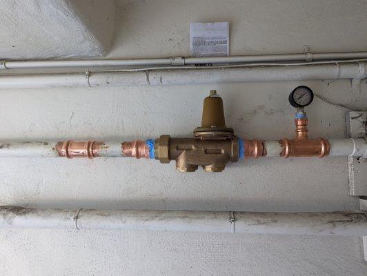 Recently installed pressure reducing valve and gauge.