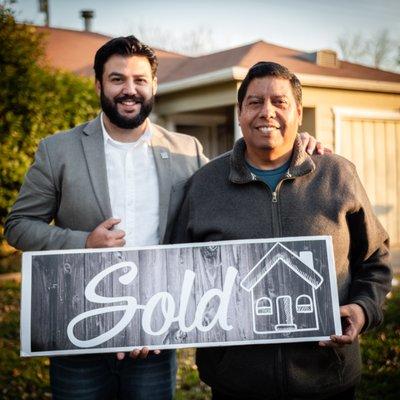 Jesse Mendoza with another happy first time homeowner.