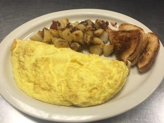 Cheese omelette served with home fries and toast