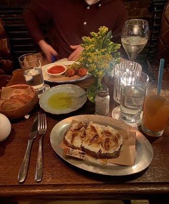 Ricotta crostini appetizer, Arancini, & bread and oil for the table