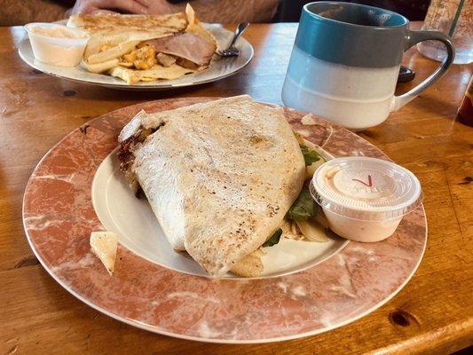 Vegan spicy potato crepe with a side of hot sauce mixed with vegan mayo...so tasty!