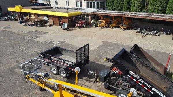 A glimpse of our boomlifts and dump trailers.