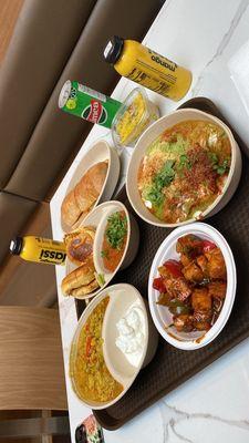 Chili paneer, khichidi, samosa chaat, pav bhaji, mango lassi, and limca