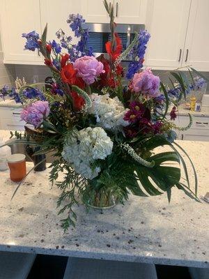 Most bizarre floral arrangement I've ever received. Red, white and blue. And pink. In November. Still scratching my head...