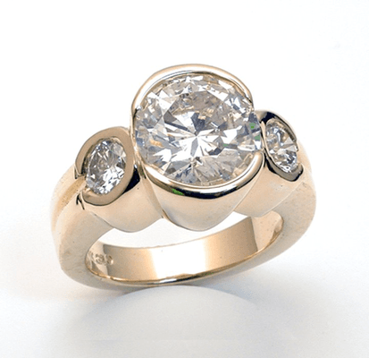 A versatile design suitable for a wedding ring or fashion ring. Custom design.