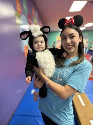 Our little girl and her Coach at The Little Gym Halloween Party