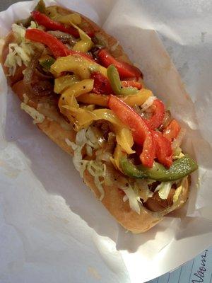 Field Roast veggie dog topped with homemade slaw and grilled peppers. Yum!