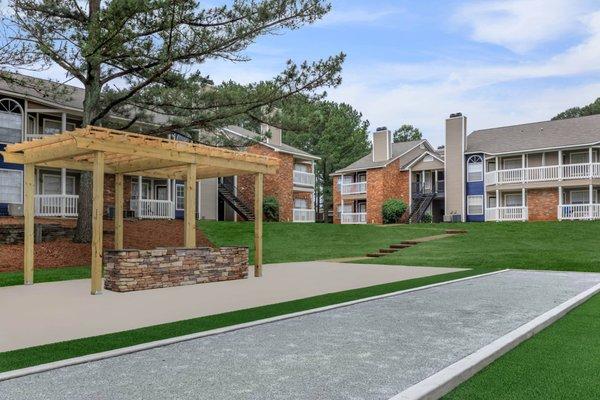 community with a walkway and grass