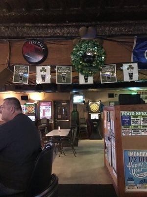 End of Bar looking in back room and exit to patio