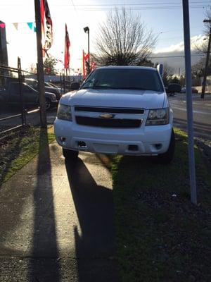 Illegally parked Front Line Ready vehicle blocking our neighborhood sidewalk.