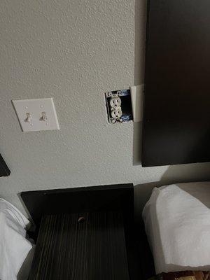 Cover missing from electrical outlet (true through the room)