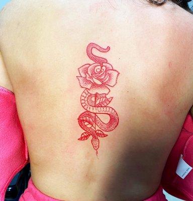 Snake with rose red tattoo