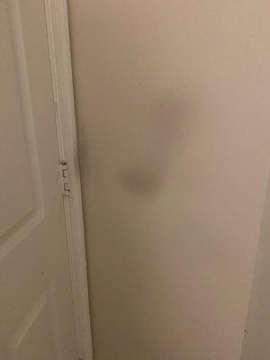 Behind bedroom door