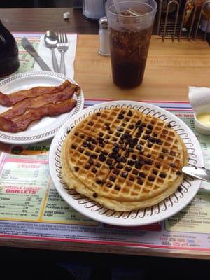 Chocolate chip waffle, bacon, and a Coke. Breakfast of....fill in the rest