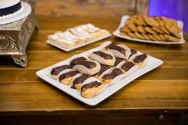 Mini eclairs, lemon squares, and chocolate chip cookies. Photo by Toanven Photography