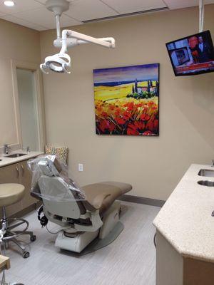 Dental Operatory with TV for patient comfort.