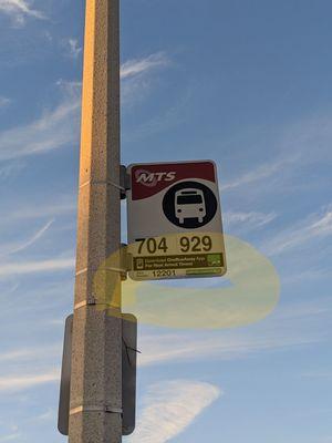 No need to be a compass.  Type in the five digit code on the bus stop and it's real time on the arrival and departure