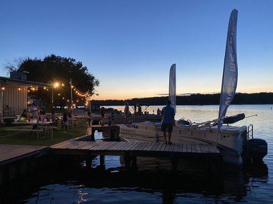 The boat parking on the lake on a Friday night while the live music played