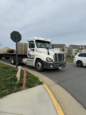 Guy decides to park on a curb and stay there knowing a school bus was on the way and the children would have to go on the street to get on