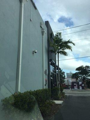 Cameras near rear of store