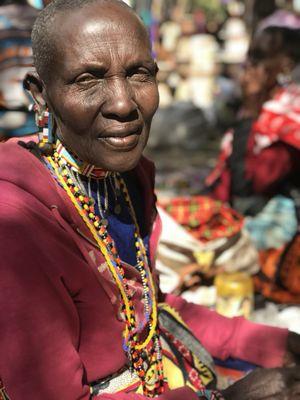 This elderly woman still active doing her business at the market