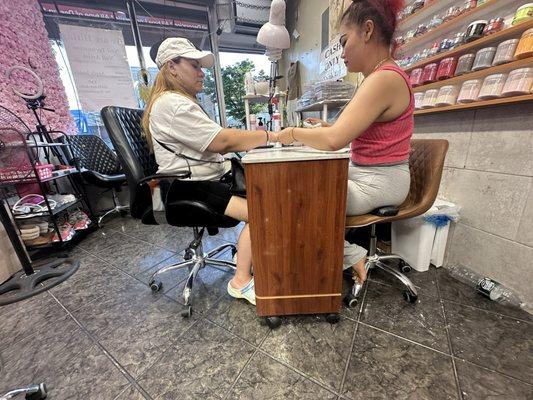 Amy hard at work getting my friends nails done