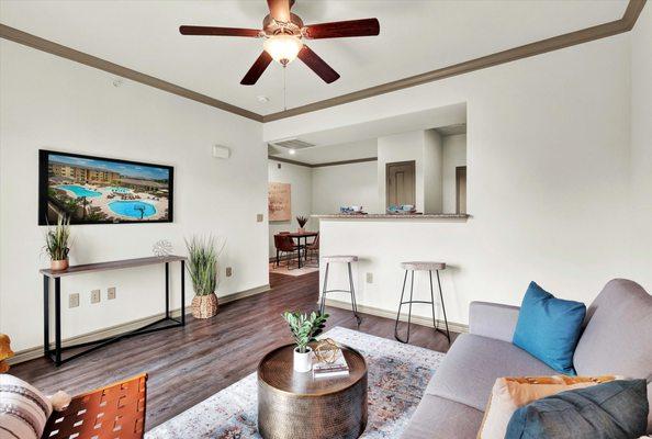 Living room with ceiling fan at Villas at Westover Hills