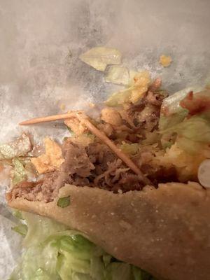 Toothpick in taco after being spit out