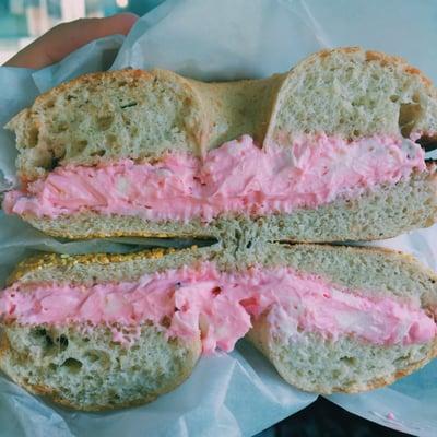 Honey wheat bagel with strawberry cream cheese