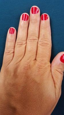 Cherry blossom. Really pretty red mani.