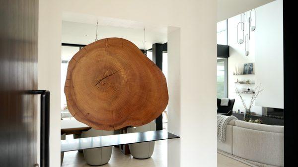 Deodar Cedar cross cut suspended in air as centerpiece of new home remodel.
Odie's natural oil finish.